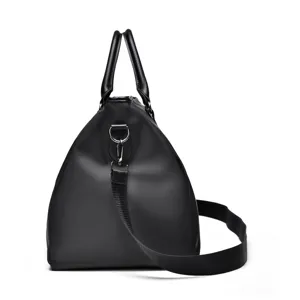 Black gym duffel bag side detail, large capacity travel handbag with adjustable shoulder strap.