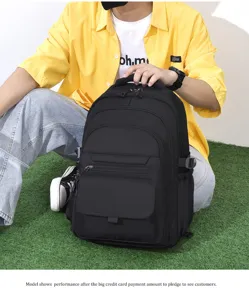Detail view of the black multi-pocket backpack, showing large capacity and durable design.