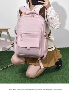 This detailed view highlights the pink Japanese style large capacity school backpack.