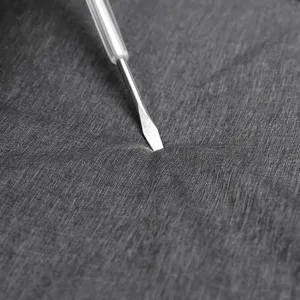 Detailed close-up of dark grey waterproof fabric texture for men's casual chest bag durable.