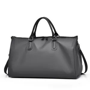 Large capacity solid color gym duffel bag for sports, fitness and short outdoor travel use.