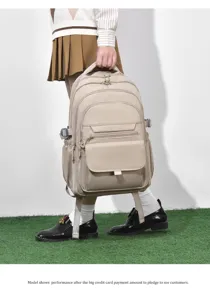 Beige student backpack detail view, large capacity casual daily commuter school bag style.