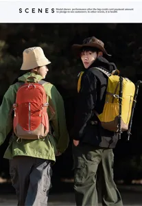 Outdoor hiking backpack detail shot showing dual shoulder straps and functional attachments.