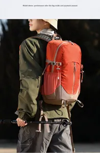 Detailed view of the outdoor hiking backpack with ergonomic straps, mesh side pockets, and durable.