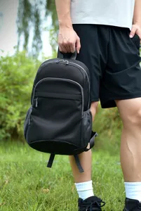 Detail view of a black outdoor foldable backpack, water-resistant casual travel daypack.