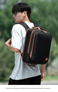 Large capacity business travel backpack with multi compartments and stylish brown PU leather trim.