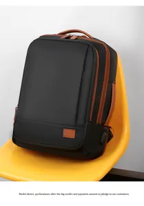 Detail view of multi-functional business travel backpack with USB port and leather trim.