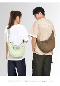 Casual crossbody crescent bag worn by models, showcasing large capacity and soft dumpling style.