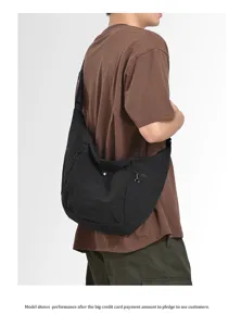 Detailed view of the black minimalist casual crossbody croissant bag showcasing soft fabric.