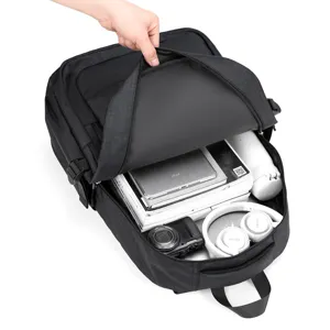 Minimalist black grid laptop backpack with large capacity, ideal for business commute.