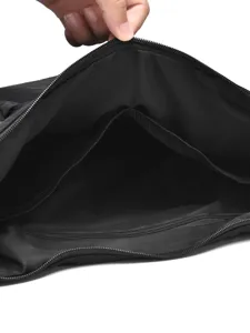 Minimalist black large capacity dumpling bag interior view, versatile soft crossbody underarm bag.