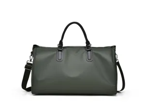 Solid color travel bag detail showing durable dark green fabric, sturdy handles and metal clips.