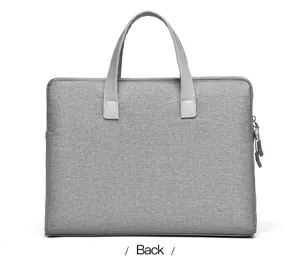 Minimalistische Business Laptoptasche aus grauem Stoff mit Griffen und sicherem Reißverschluss.