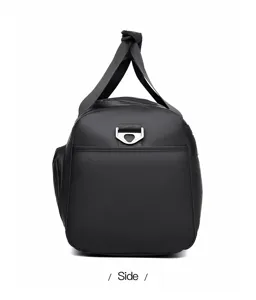 Side detail view of black waterproof gym travel duffel bag with durable metal hardware.