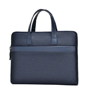 Klassische blaue Business Laptoptasche mit langlebigen Griffen und sicherem Reißverschluss.