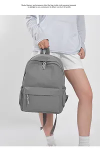 Grey minimalist casual backpack detailed view, stylish daily student book bag for travel.