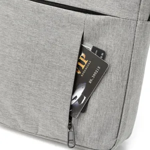 Men's casual grey nylon messenger bag front zipper pocket detail main product view.