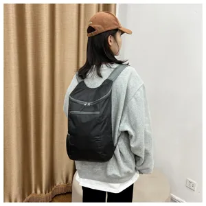 Lightweight foldable black backpack, waterproof outdoor travel daypack for daily fitness sports.