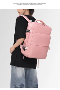 Detail shot of pink casual backpack showing multi-compartment design and side buckle straps.