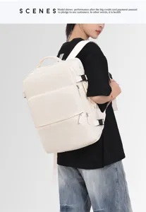 Detail view of large capacity casual laptop backpack worn by model, unisex design for use.