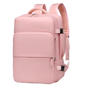 Large capacity pink casual backpack, stylish laptop school bag for women and men daily use.