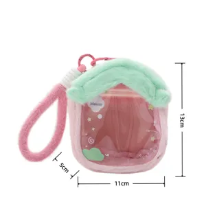 Plush doll transparent display bag detail, cute house shape with green roof and strap.