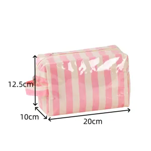 Pink striped PVC cosmetic bag detail, featuring durable zipper and portable side handle.