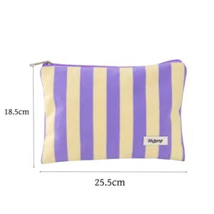 Striped portable cosmetic bag travel makeup pouch zipper toiletry storage bag detail view.