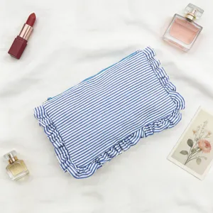 Blue white striped seersucker cosmetic bag with ruffle lace, portable travel makeup storage pouch.