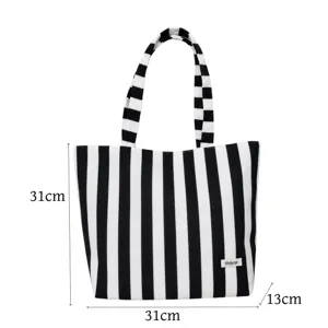 Classic black and white striped canvas tote bag with spacious interior and sturdy straps.