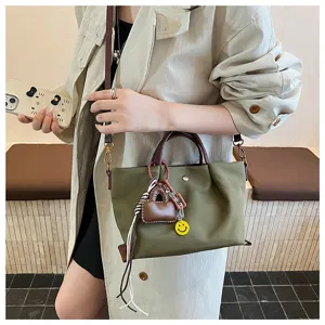 Simple versatile casual handbag for women, lightweight waterproof shoulder crossbody bag.