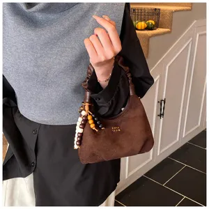 Vintage suede pleated dumpling handbag for women, chic winter shoulder bag with beads.