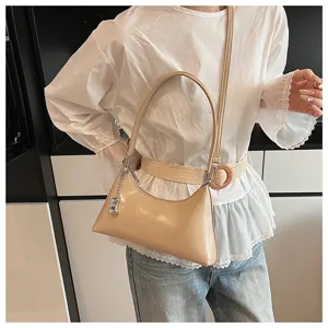 Elegant vintage women shoulder bag, minimalist hobo design, casual daily commuter handbag.
