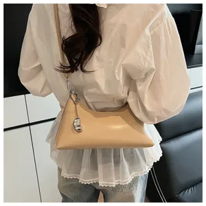 Stylish retro underarm shoulder bag with metal chain, chic commuter crossbody pillow bag.