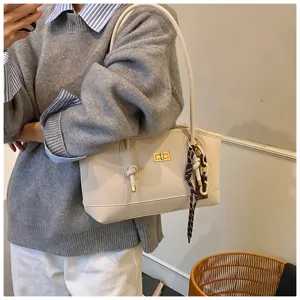 Stylish casual shoulder tote bag for women, large capacity design for daily commuter and office use.