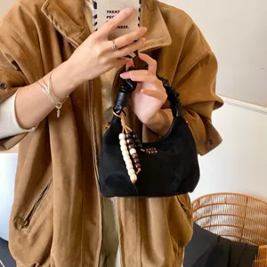 Retro black faux suede hobo bag for women, chic pleated dumpling handbag with beads.