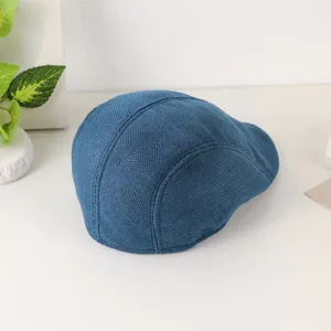 Blue linen-texture ivy cap close-up, showing breathable fabric and classic retro design.