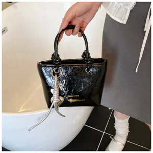 Textured retro patent leather mini handbag for women, chic black daily crossbody shoulder bag.