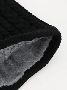 Close-up detail view of black cable knit winter fleece lined neck warmer gaiter for cold weather.