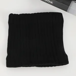 Black knitted neck warmer for winter, soft ribbed fleece lined thermal winter scarf.