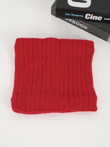 Red knitted winter neck warmer detail shot, soft fleece lined windproof snood scarf for cold days.