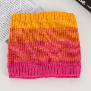 Detailed view of the colorful knitted neck warmer, showing soft texture and vibrant gradient.