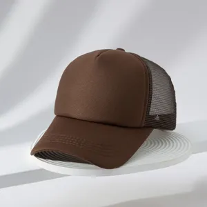 Brown trucker cap detail, breathable mesh back panel and structured foam front for summer outdoor.