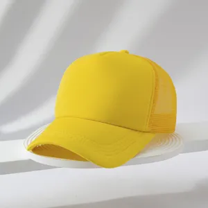Detailed view of bright yellow trucker hat, foam front panel, breathable mesh back.