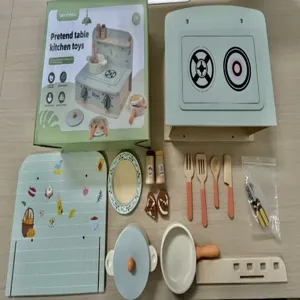 Wooden pretend kitchen toy set details, including stove, pots, plates and cute cooking utensils.