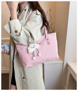 Pink canvas tote bag for women with cute cloud pendant, large capacity casual shoulder bag.