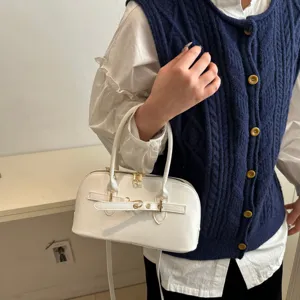 Stylish white dome handbag for women, versatile PU leather crossbody tote bag for daily use.
