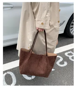 Brown suede tote bag detail, casual daily commuter shoulder bag with large capacity.