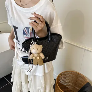 Summer woven bucket handbag for women with cute bear pendant chic casual shoulder bag trendy