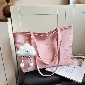 Pink star pattern tote bag large capacity women handbag with cute plush cloud keychain.